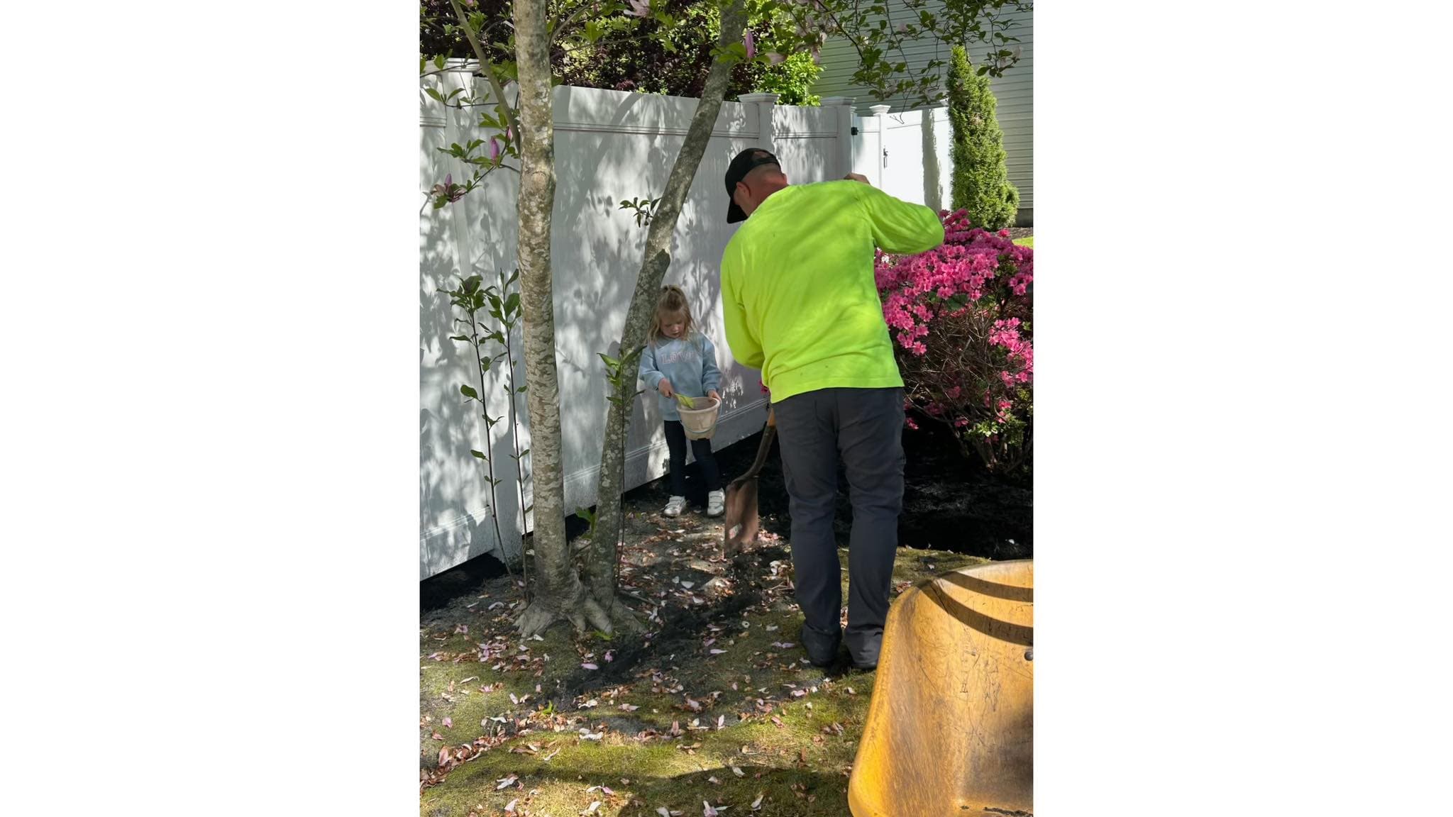 Tyler Warker working on a garden bed renovation at an Absecon, NJ home